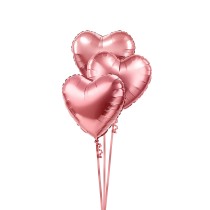 Heart-shaped metallic shining pink balloons