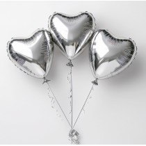 Heart-shaped metallic shining silver balloons