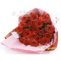 Bouquet composed of 19 fresh red roses in full bloom gathered with gardenia leaves.