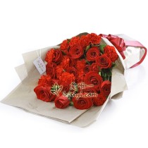 Bouquet of red roses and red carnations