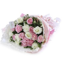 12 pink roses Marie and 8 white roses accented by pinathus japonicus and fresh greens.